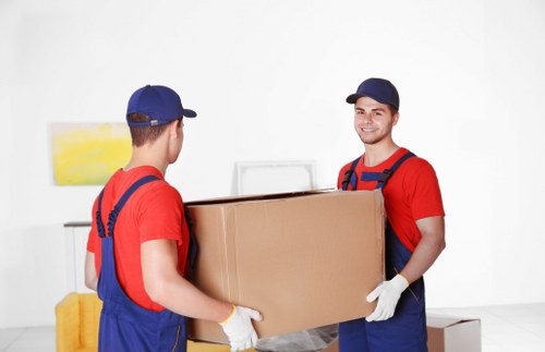 Professional waste clearance team sorting recyclable materials